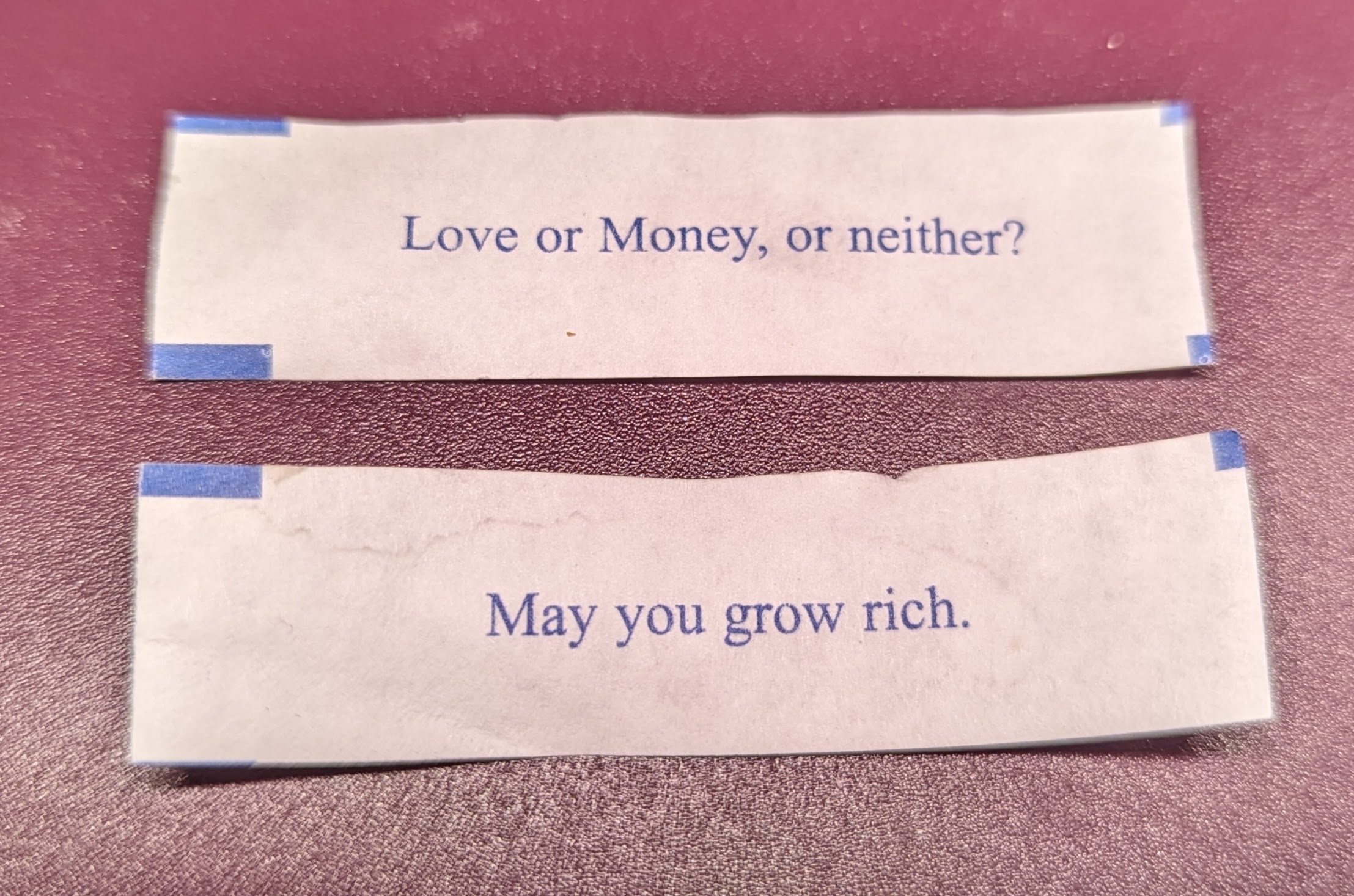 two more fortune cookie paper slips